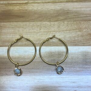 gold hoop earrings with gold looped crystal charm